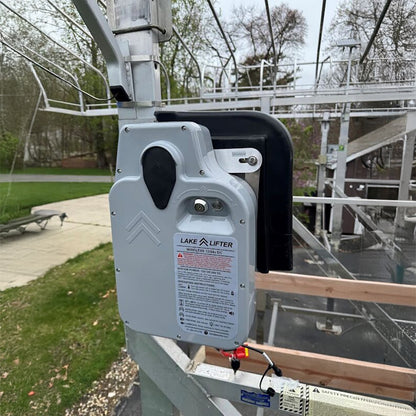 Lake Lifter device on a metal structure with a park-like background