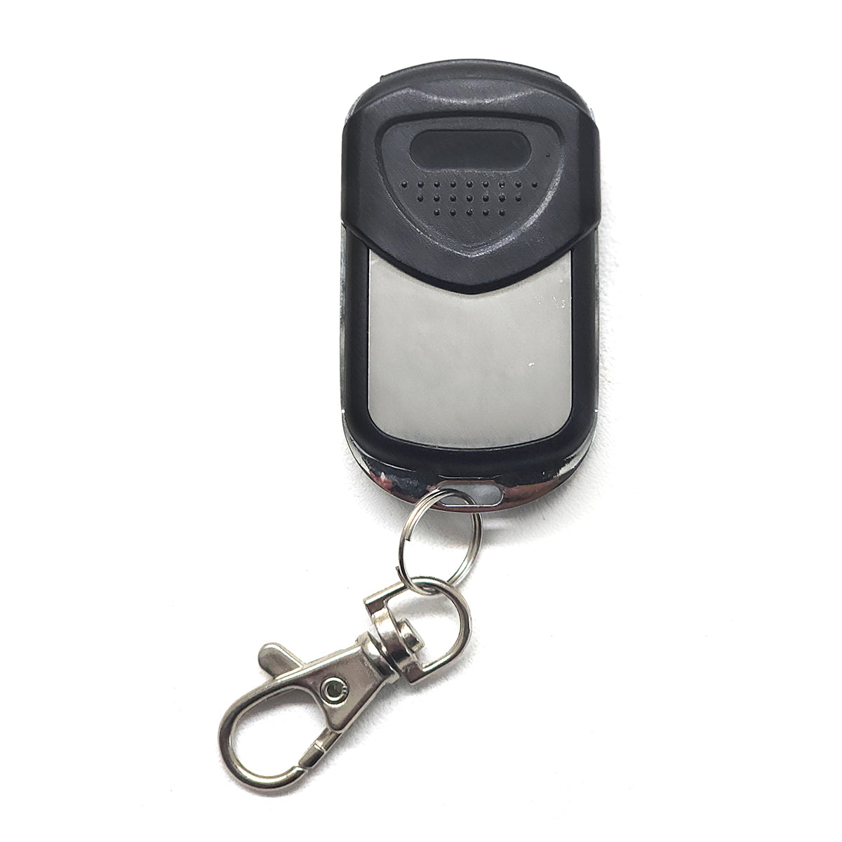Black remote control with keychain on a white background