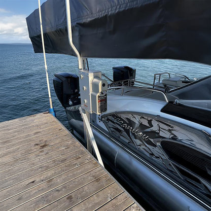 Boat docked at a wooden pier with water in the background