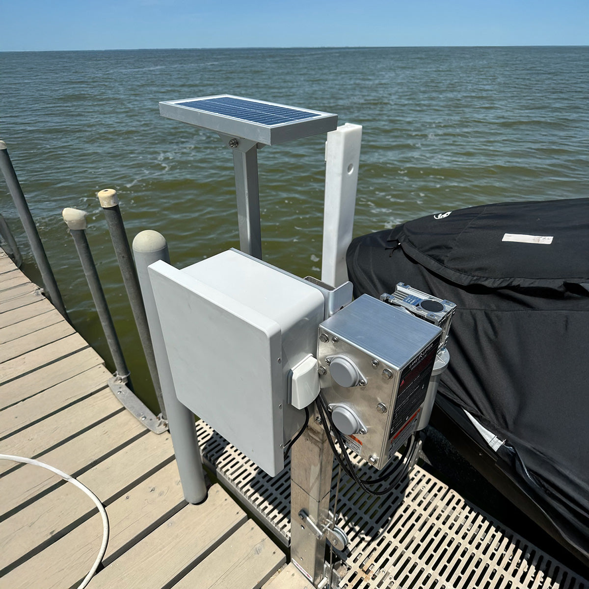 Solar panel and electronic equipment on a dock by the water