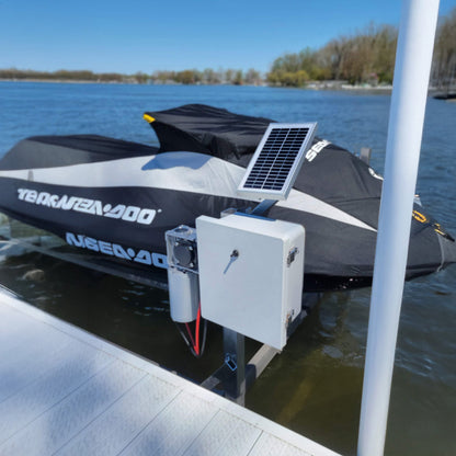 Solar panel on a jet ski docked at a lakeside