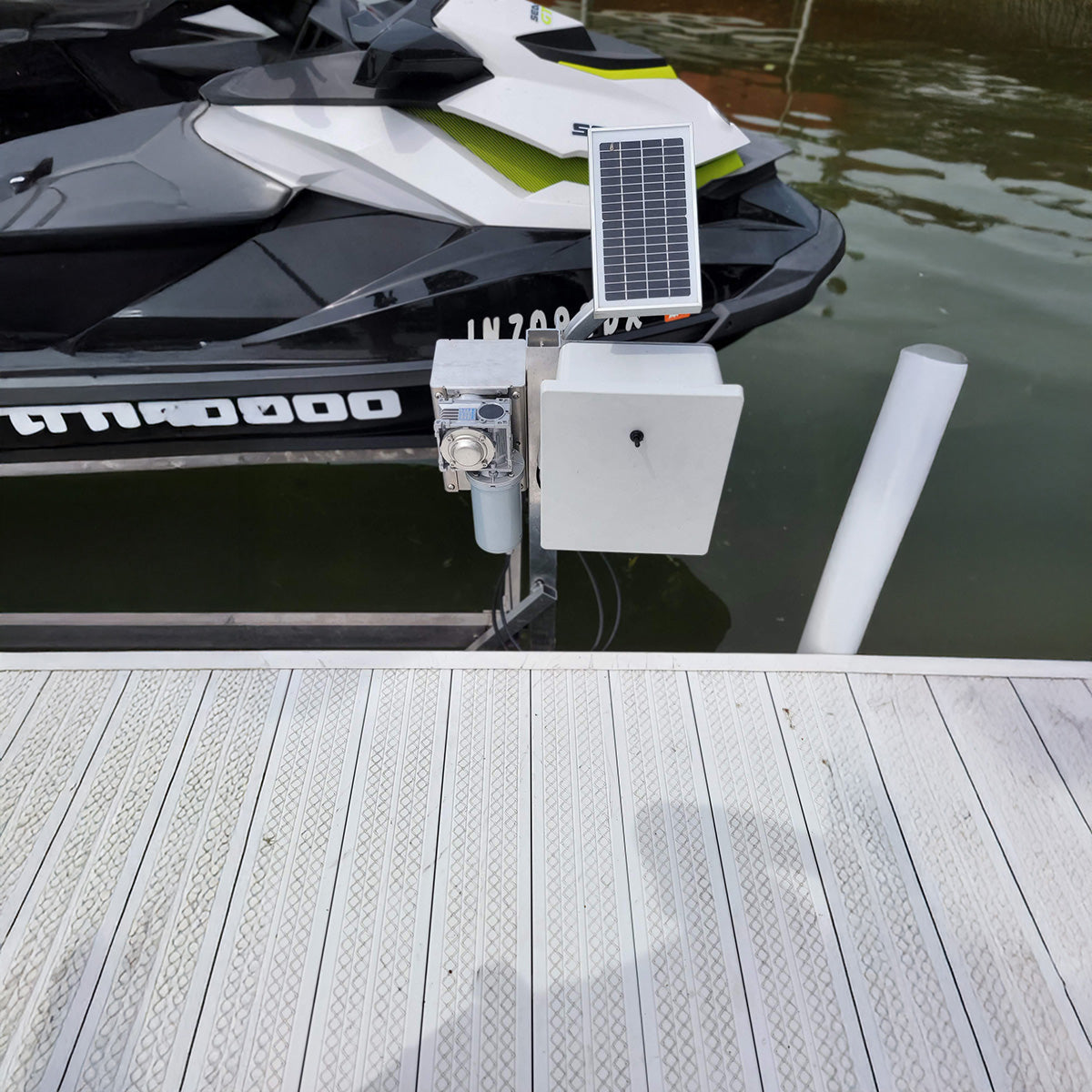 Solar panel attached to a boat on a dock