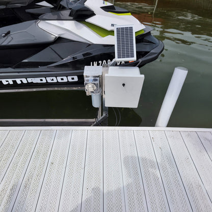 Solar panel attached to a boat on a dock