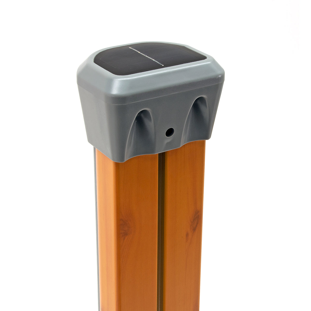 Solar light fixture on a wooden post against a white background