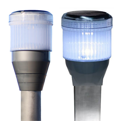 Two solar-powered outdoor lights on white background