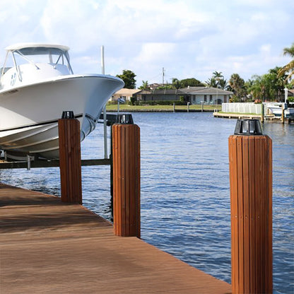 Wooden dock with boat and waterfront view
