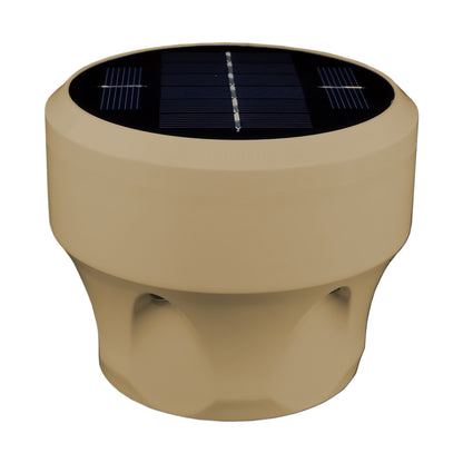 Beige cylindrical object with a solar panel on top against a white background