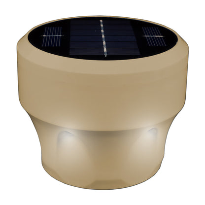 Beige solar light with a black solar panel on a white background