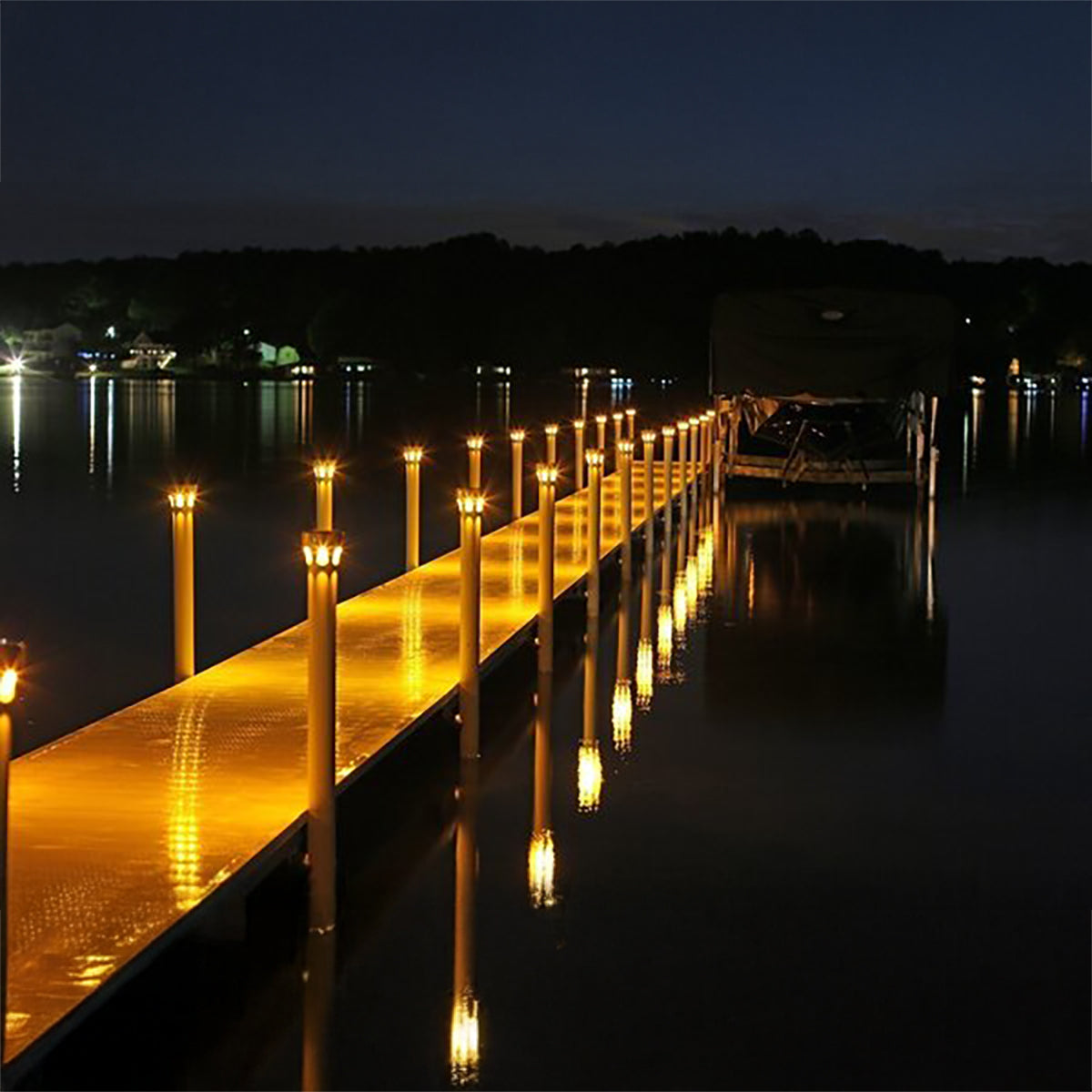 Solar underglow lights glowing along a dock at night